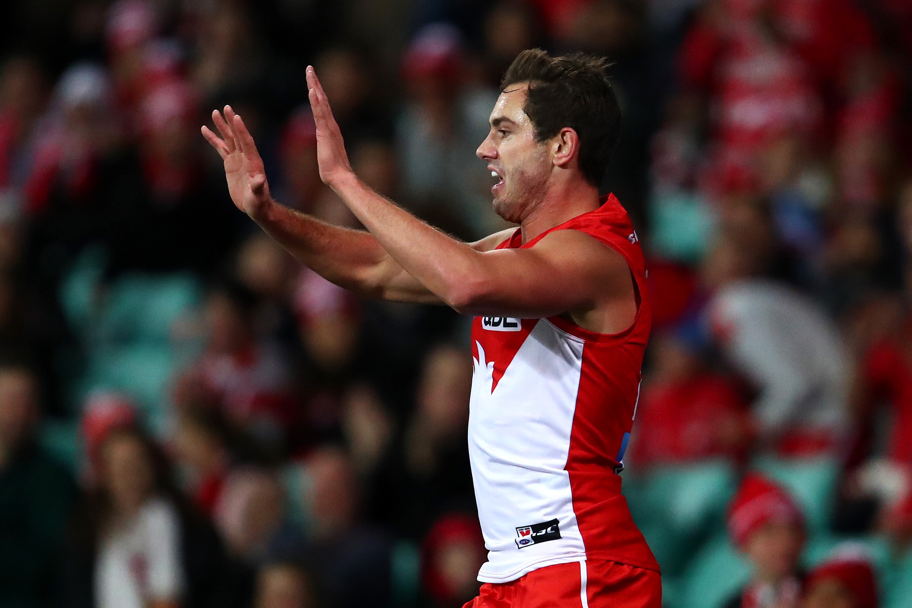 AFL 2019 Round 14 - Sydney v Hawthorn SYDNEY, AUSTRALIA - JUNE 21: Daniel Menzel of the Swans celebrates kicking a goal during the round 14 AFL match between the Sydney Swans and the Hawthorn Hawks at Sydney Cricket Ground on June 21, 2019 in Sydney, Australia. (Photo by Cameron Spencer/AFL Photos/via Getty Images)